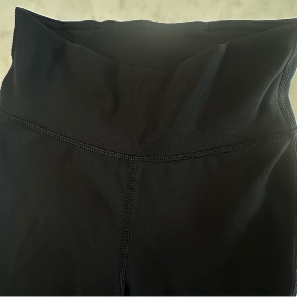 Lululemon Black “Tied to it” High Rise Leggings with mesh/tied ankle detail. - Picture 9 of 13